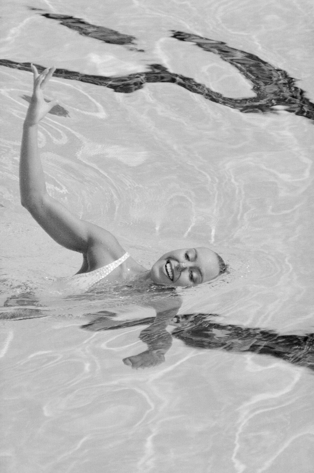 Tracie Ruiz Performing Synchronized Swimming Routine